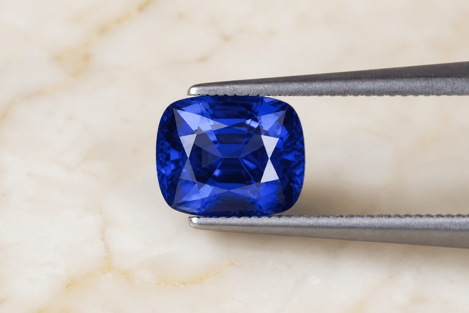 The same sapphire after chip repair, with clean facets and restored brilliance